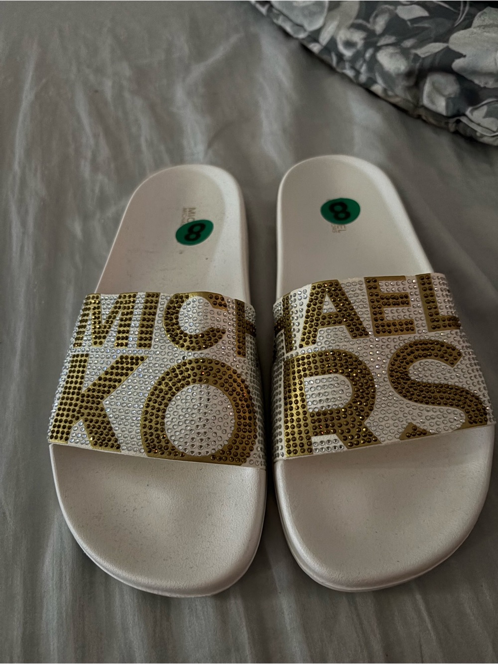 Michael Kors White Slides with Gold Crystal Logo Strap